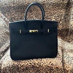 Structured Black Leather Top-Handle Satchel with Gold Hardware